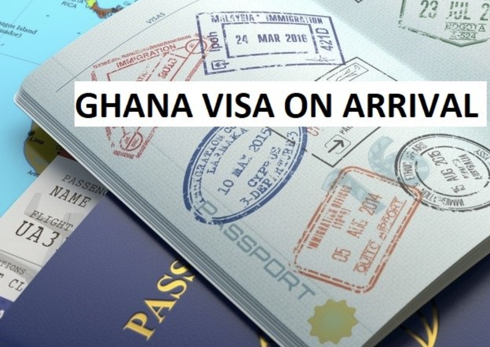 Visa book being stamped in with Ghana stamp